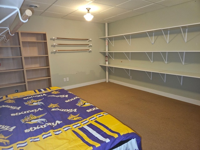 1504 4th St NE, Willmar, MN 56201 - carpeted bedroom with a paneled ceiling