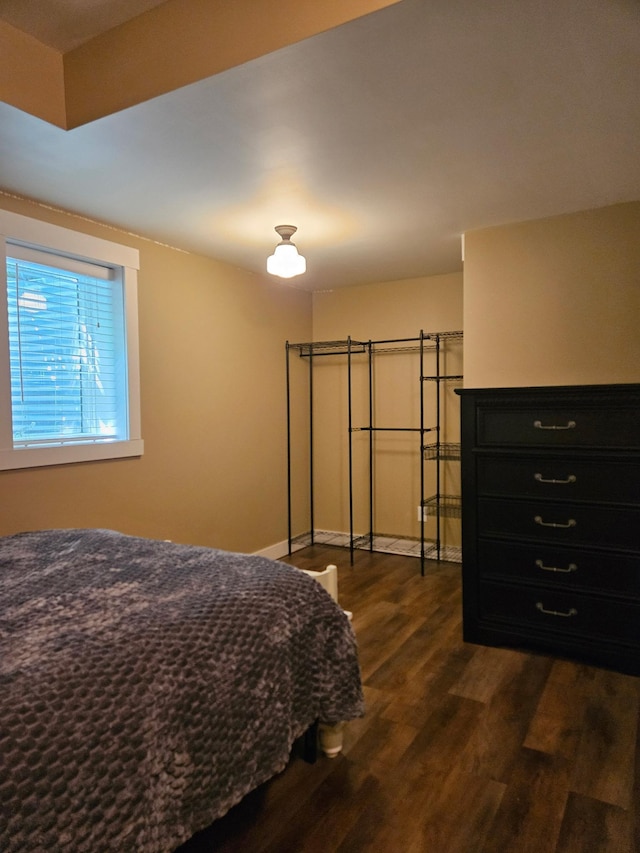 1504 4th St NE, Willmar, MN 56201 - bedroom featuring dark wood-style flooring