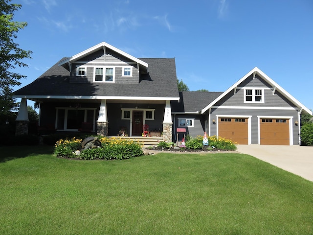 1504 4th St NE, Willmar, MN 56201 - craftsman-style home with covered porch, a front yard, concrete driveway, and roof with shingles