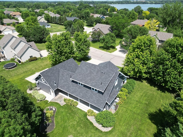 1504 4th St NE, Willmar, MN 56201 - aerial perspective of suburban area with a nearby body of water