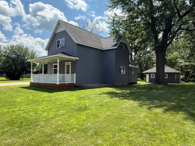 681 8th St, Walnut Grove, MN 56180 - view of property exterior with roof with shingles, covered porch, and a lawn