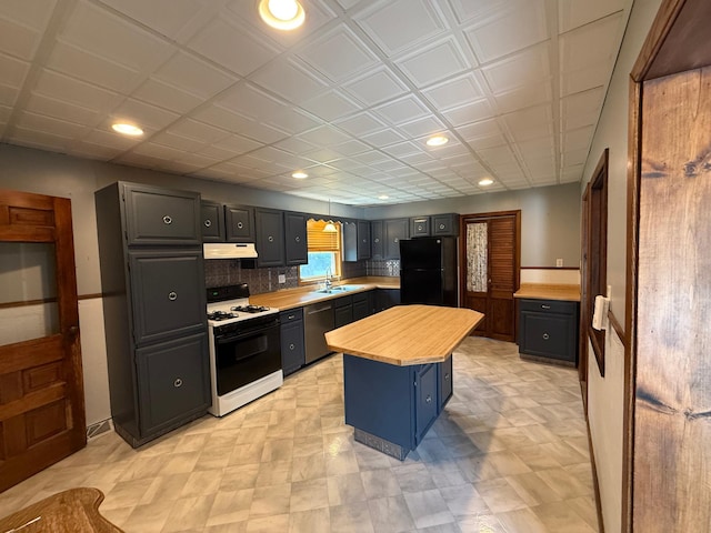 681 8th St, Walnut Grove, MN 56180 - kitchen featuring white gas range, freestanding refrigerator, stainless steel dishwasher, under cabinet range hood, and wood counters