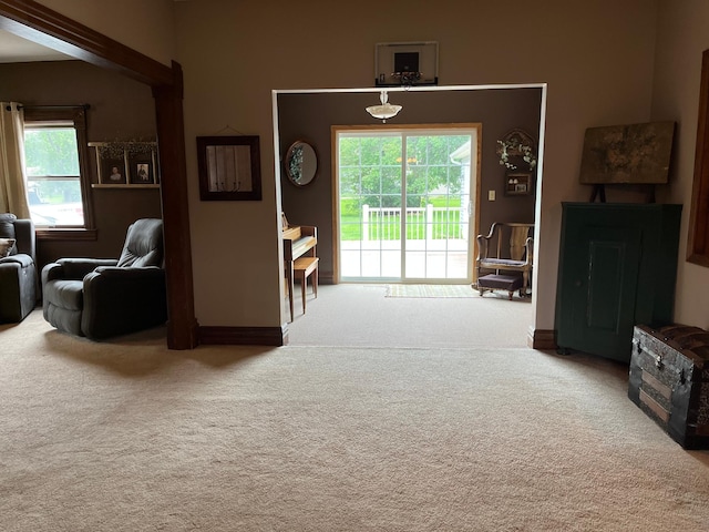 681 8th St, Walnut Grove, MN 56180 - carpeted living room featuring healthy amount of natural light