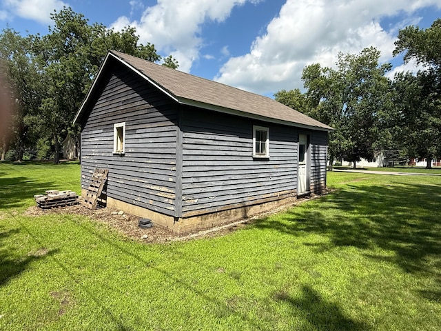681 8th St, Walnut Grove, MN 56180 - view of home's exterior with a lawn