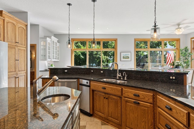 12795 Ozark Trl N, May Twp, MN 55082 - kitchen featuring ceiling fan, healthy amount of natural light, decorative light fixtures, and dishwasher