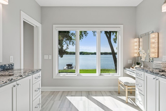 12795 Ozark Trl N, May Twp, MN 55082 - full bath featuring vanity and a water view