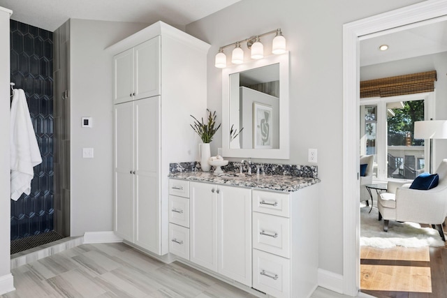 12795 Ozark Trl N, May Twp, MN 55082 - full bath featuring vanity, tiled shower, and recessed lighting