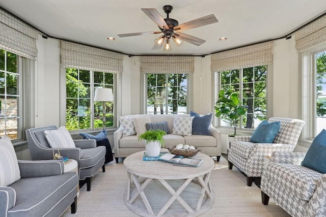 12795 Ozark Trl N, May Twp, MN 55082 - sunroom / solarium with an outdoor hangout area and a ceiling fan