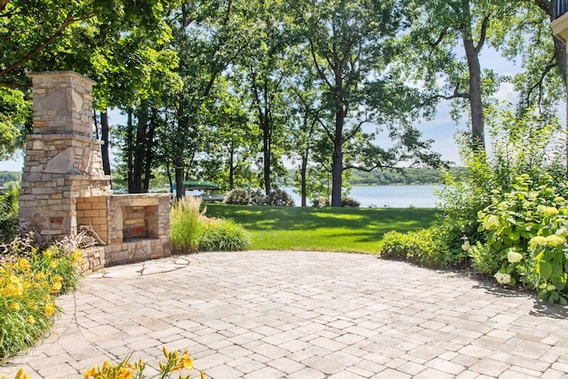 12795 Ozark Trl N, May Twp, MN 55082 - view of patio featuring a water view