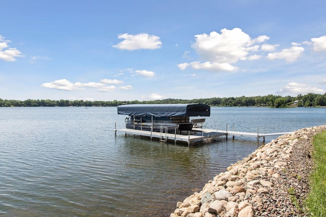 12795 Ozark Trl N, May Twp, MN 55082 - dock with boat lift and a water view