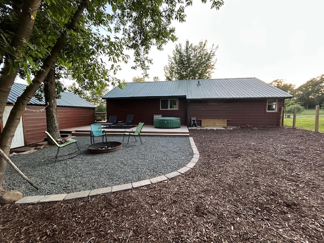 30290 7th Ave N, Swiss Twp, WI 54830 - rear view of property featuring a metal roof and a patio area