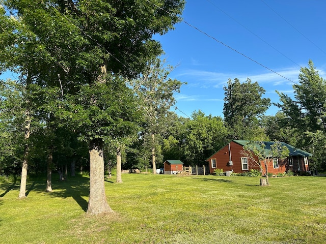 30290 7th Ave N, Swiss Twp, WI 54830 - view of grassy yard featuring a storage unit