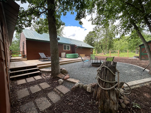 30290 7th Ave N, Swiss Twp, WI 54830 - view of yard with a deck and a fire pit