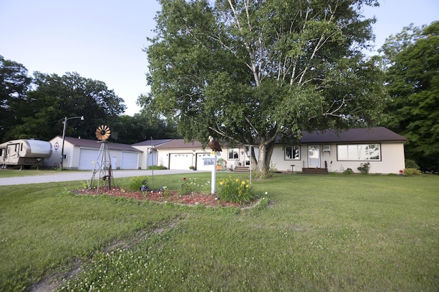 39070 County Highway 67, Newton Twp, MN 56567 - ranch-style house featuring a detached garage and a front yard