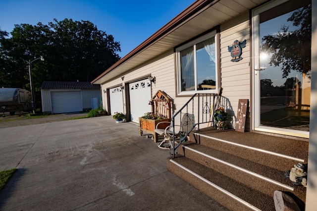 39070 County Highway 67, Newton Twp, MN 56567 - view of side of home featuring a garage and concrete driveway