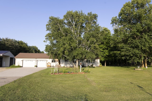39070 County Highway 67, Newton Twp, MN 56567 - view of front of home with driveway, a front lawn, and an attached garage