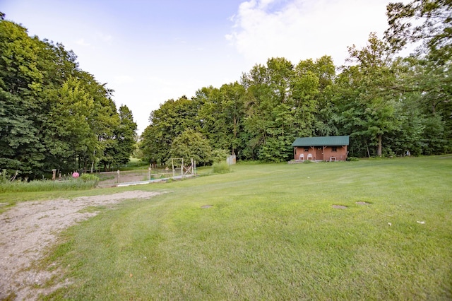 39070 County Highway 67, Newton Twp, MN 56567 - view of green lawn with an outdoor structure