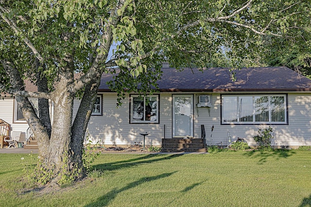 39070 County Highway 67, Newton Twp, MN 56567 - view of front facade featuring a front lawn, entry steps, and a shingled roof