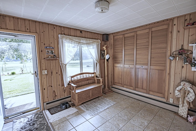 39070 County Highway 67, Newton Twp, MN 56567 - entrance foyer featuring baseboard heating and wood walls
