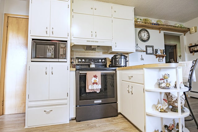 39070 County Highway 67, Newton Twp, MN 56567 - kitchen with electric stove, black microwave, under cabinet range hood, open shelves, and white cabinetry