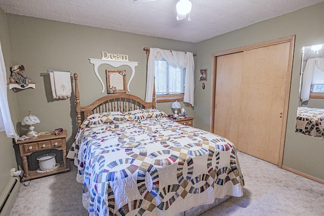39070 County Highway 67, Newton Twp, MN 56567 - bedroom featuring baseboard heating, light carpet, a closet, ceiling fan, and a textured ceiling