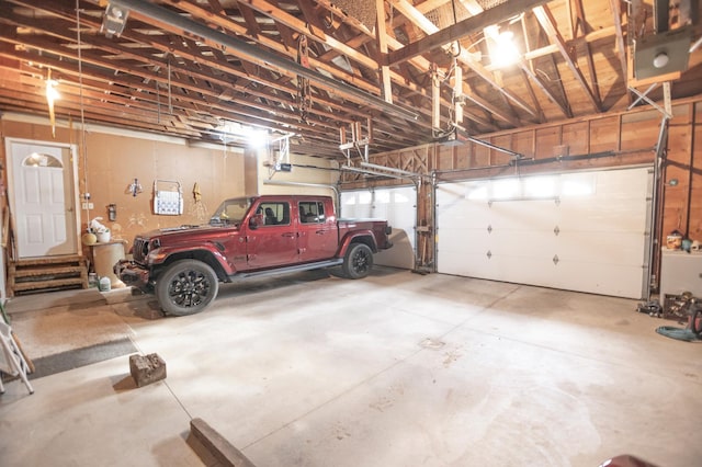 39070 County Highway 67, Newton Twp, MN 56567 - garage featuring a garage door opener
