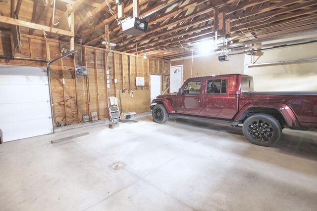 39070 County Highway 67, Newton Twp, MN 56567 - garage featuring a garage door opener