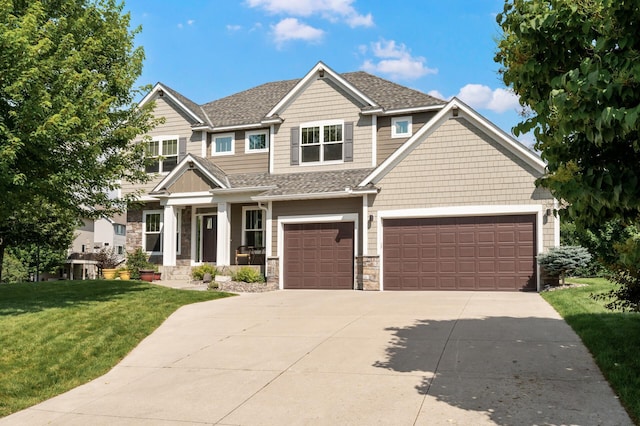 10412 Florida Ave N, Brooklyn Park, MN 55445 - craftsman inspired home with driveway, a front yard, stone siding, a porch, and roof with shingles