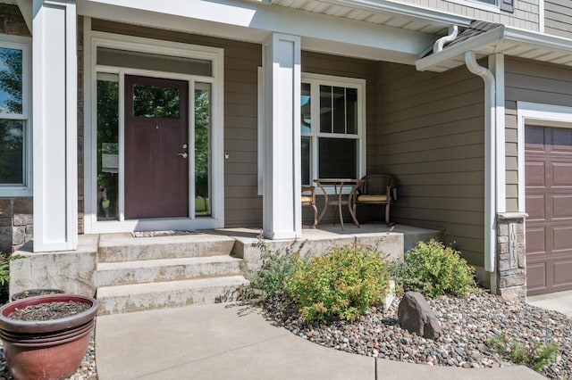 10412 Florida Ave N, Brooklyn Park, MN 55445 - doorway to property with a porch and a garage