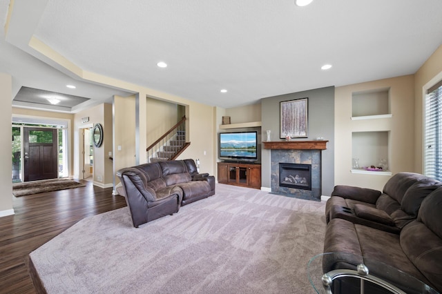 10412 Florida Ave N, Brooklyn Park, MN 55445 - living room with stairway, wood finished floors, recessed lighting, and a fireplace