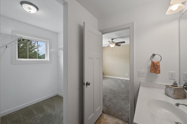 10412 Florida Ave N, Brooklyn Park, MN 55445 - bathroom featuring ceiling fan and vanity