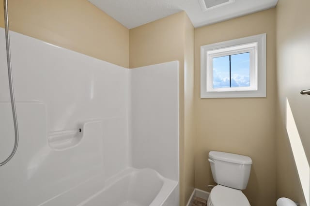 10412 Florida Ave N, Brooklyn Park, MN 55445 - bathroom featuring toilet and  shower combination