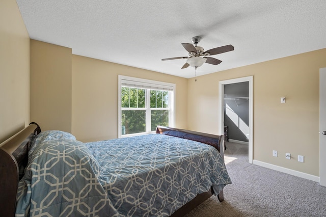 10412 Florida Ave N, Brooklyn Park, MN 55445 - carpeted bedroom featuring a textured ceiling and ceiling fan