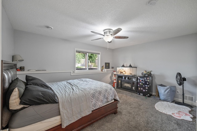 10412 Florida Ave N, Brooklyn Park, MN 55445 - bedroom featuring carpet, ceiling fan, and a textured ceiling