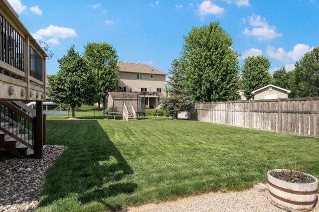 10412 Florida Ave N, Brooklyn Park, MN 55445 - view of yard with stairs and a trampoline