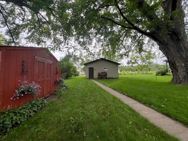 416 Wallace St N, Delano, MN 55328 - view of green lawn with a storage unit