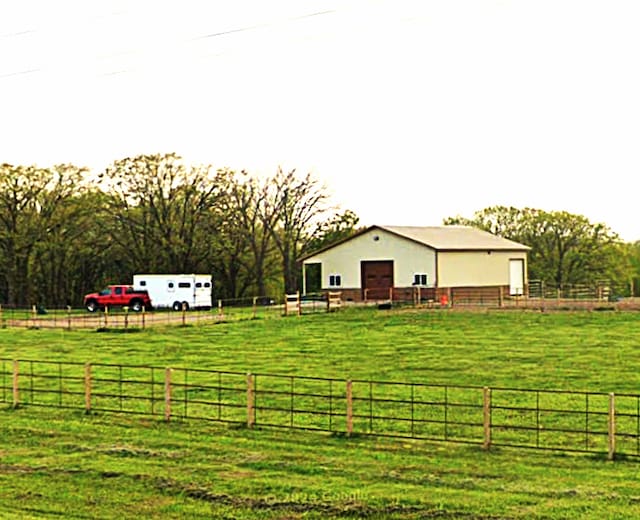 5776 County Road 23 SE, Alexandria, MN 56308 - view of yard featuring a rural view, a pole building, an outbuilding, and an enclosed horse arena
