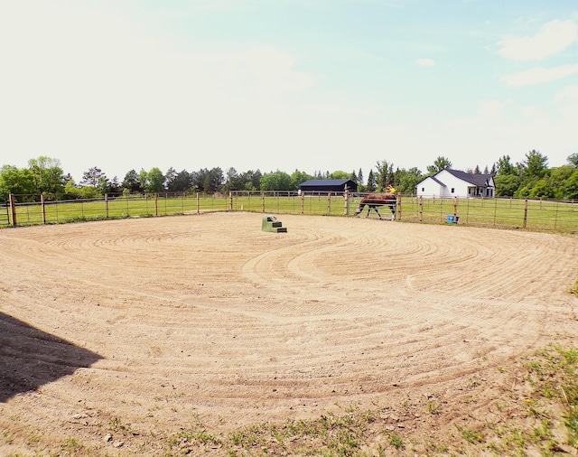 5776 County Road 23 SE, Alexandria, MN 56308 - view of yard featuring an enclosed horse arena and a rural view