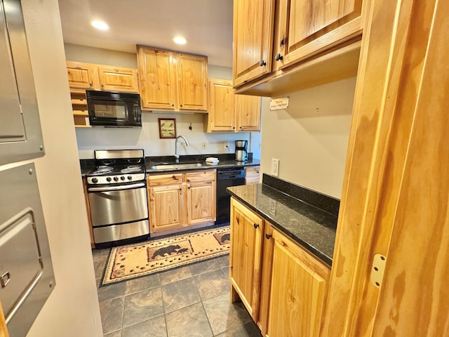 140 Bridge Run Ln Unit C, Lutsen Twp, MN 55615 - kitchen featuring black appliances, recessed lighting, dark stone countertops, and light brown cabinets