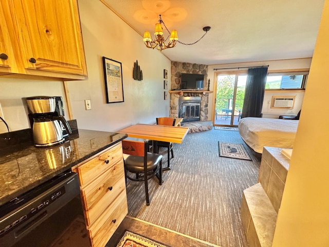 140 Bridge Run Ln Unit C, Lutsen Twp, MN 55615 - bedroom featuring access to outside, a chandelier, a fireplace, dark colored carpet, and an AC wall unit