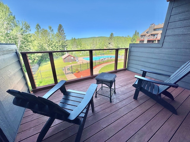 140 Bridge Run Ln Unit C, Lutsen Twp, MN 55615 - wooden terrace featuring a yard