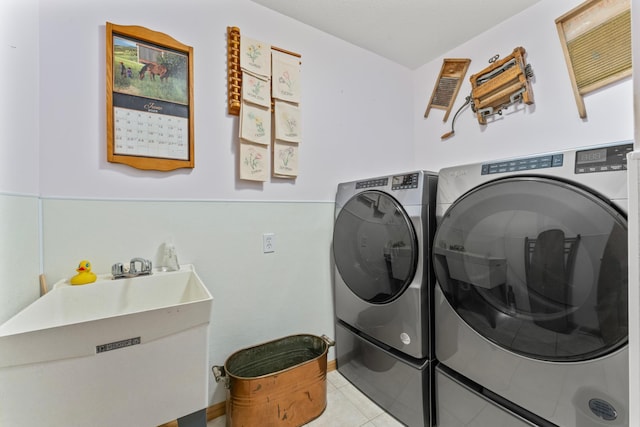 1405 17th Dr SW, Austin, MN 55912 - laundry area featuring washing machine and clothes dryer and tile patterned flooring
