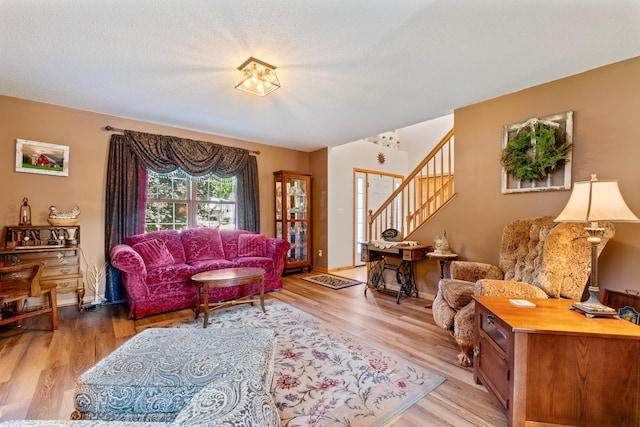 1405 17th Dr SW, Austin, MN 55912 - living area featuring stairs and wood finished floors