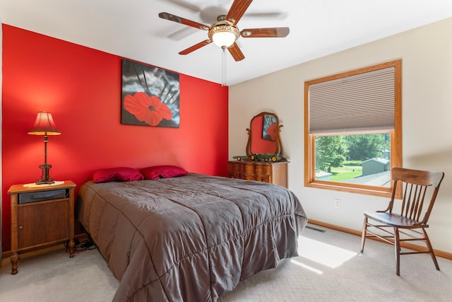 1405 17th Dr SW, Austin, MN 55912 - carpeted bedroom with baseboards and a ceiling fan