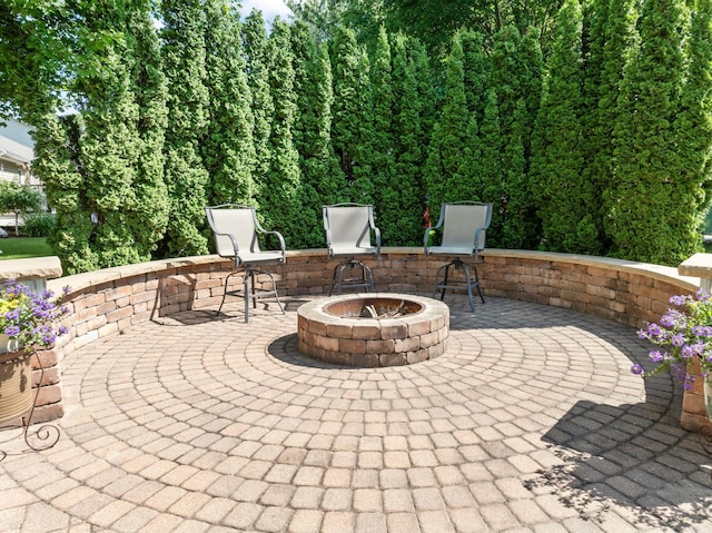 1405 17th Dr SW, Austin, MN 55912 - view of patio with a fire pit