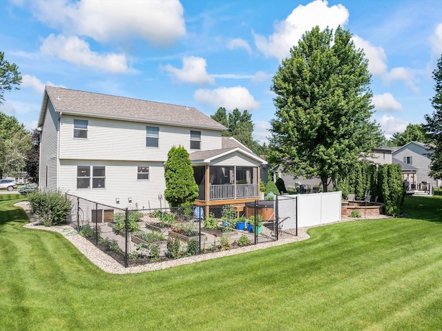 1405 17th Dr SW, Austin, MN 55912 - back of property with a garden, a sunroom, and roof with shingles