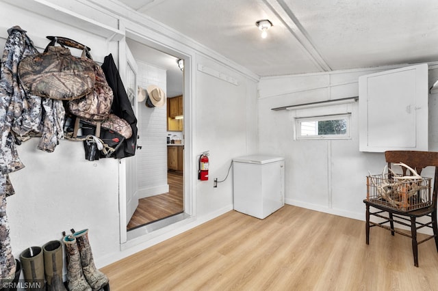 W10429 Hinker Rd, Foster Twp, WI 54493 - interior space with refrigerator and light wood-type flooring