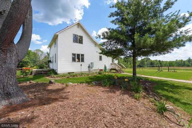 W10429 Hinker Rd, Foster Twp, WI 54493 - view of side of home featuring a lawn