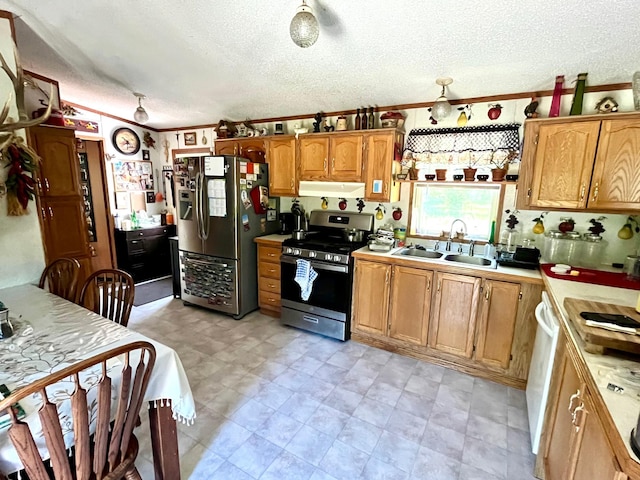 31700 Cherry Lake Rd, Ogema, MN 56569 - kitchen with stainless steel appliances, extractor fan, a textured ceiling, light countertops, and brown cabinets