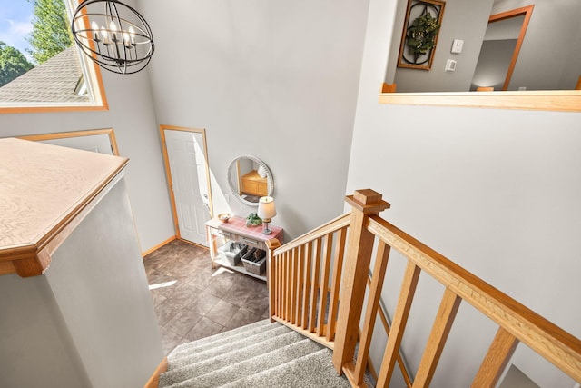 911 Hazelwood Ct, Buffalo, MN 55313 - staircase with a chandelier